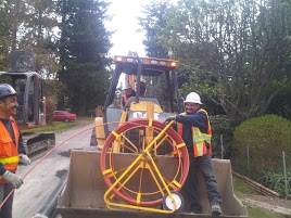 budget sewer van workers doing trenchless pipe repair